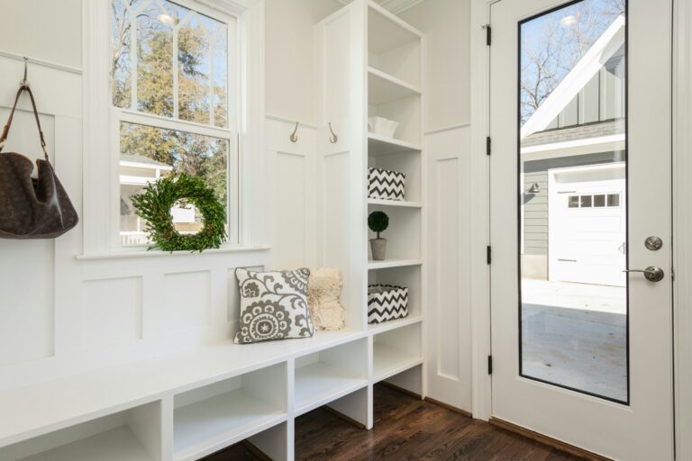 Organized mudroom with hooks and storage cubbies