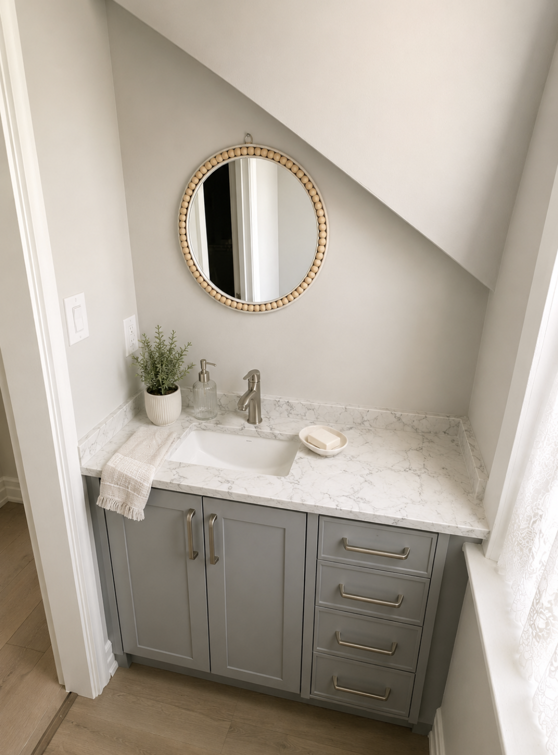 Compact powder room vanity with marble-look countertop