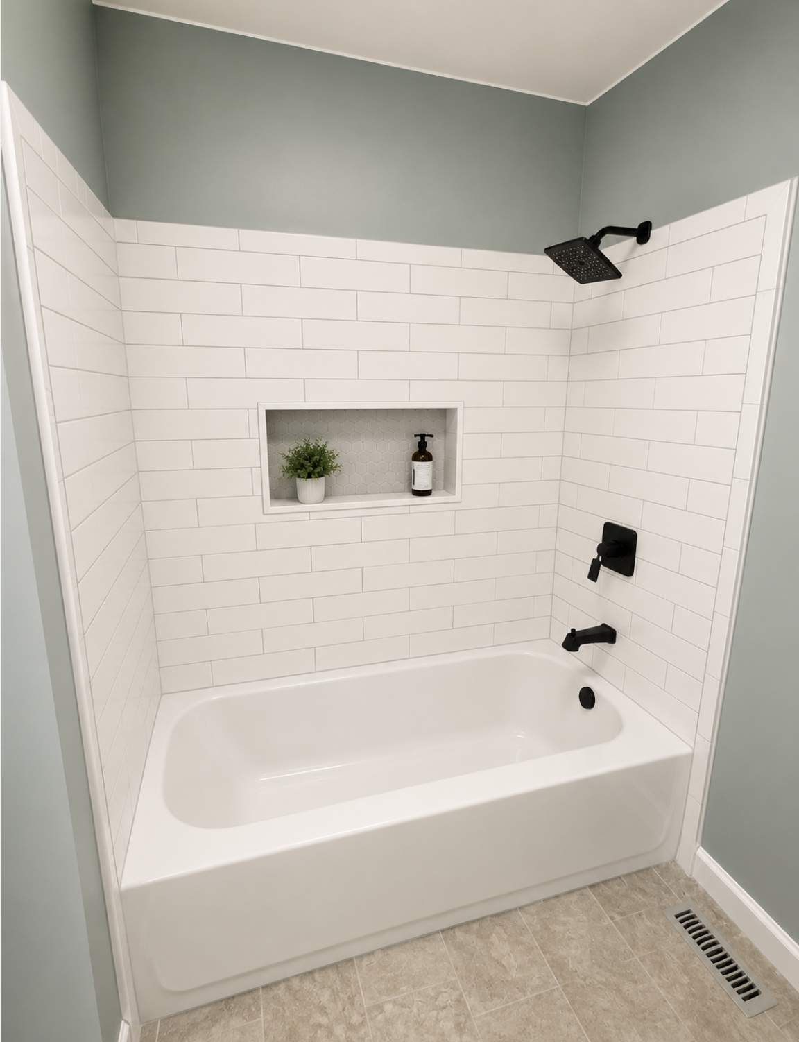 Bathtub and shower combo with white subway tile